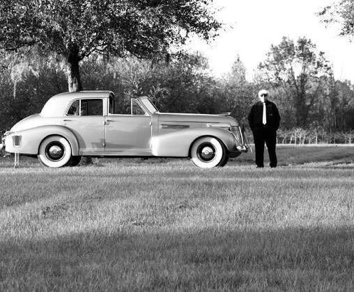 Vintage Cadillac available as a chauffeured classic car rental